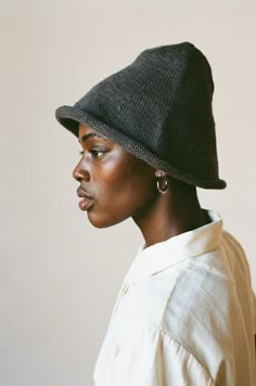 A knit bucket-style hat with seamless construction and a rolled edge. Flexible, moldable, and packable for every adventure to come. Naturally dyed using the earth, charcoal is a smoky gray. Knit Bucket Hat, Cool Hat, Hair Wrap Scarf, Drawing People Faces, Types Of Hats, Photography Inspiration Portrait, Matching Sweaters, Cool Hats, Natural Dye