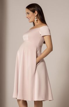 Our bestselling Aria Maternity Dress is now available in a soft Rose Pink hue. The perfect dress for special occasions this summer, the stylish bardot neckline sits just off the shoulder and a sleek skirt falls perfectly over your bump. Featuring gentle darts under the bust and a concealed zip to the back for a flawless fit. Just add the Aurelia Sash (sold separately) for extra sparkle. Off the shoulder maternity dress Discrete elastic inside neckline for support Darted bust to fit and flatter C Off Shoulder Maternity Dress, Pregnant Party Dress, Pregnant Dress, Cute Maternity Dresses, Maternity Wedding, Formal Maternity Dress, Tiffany Rose, Francescas Dresses, Dresses For Pregnant Women