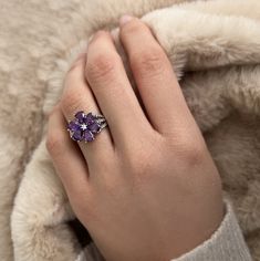 Amethyst Magnolia Flower Silver Ring ABOUT PRODUCT ○ Our collection, embroidered with Silver, is a true expression of elegance. Each piece of silver jewelry is designed with special hand craftsmanship. Every detail has been carefully considered and each stone has been carefully selected. ○ Our 925 sterling Silver Jewelry is made of high quality materials. Silver offers durability and shine. ○ Our collection includes a wide variety of jewelry designs suitable for different styles and tastes. From Flower Ring Wedding, Wedding Ring Flower, Silver Flower Ring, Ring Purple, Ring Flower, Purple Love, Magnolia Flower, Rings Simple, Flower Ring