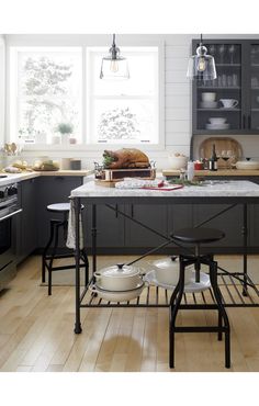 a kitchen with an island in the middle