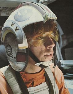 a man wearing a star wars helmet and goggles