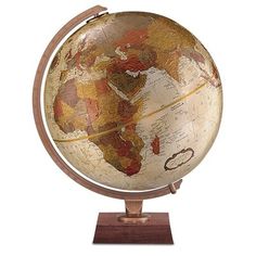 an old world globe is shown on a wooden stand with the word's name written on it