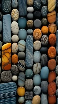 many different colored rocks are arranged together