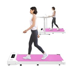 a woman is walking on a pink treadmill