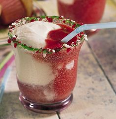 two glasses filled with ice cream and strawberries