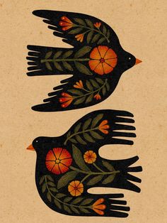 two black birds with orange flowers and leaves on their wings are facing opposite directions to each other