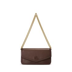 The versatile Sawyer bag features a removable convertible chain strap allowing you to style it as a shoulder bag crossbody or clutch. Featuring a tonal “LRL” push-lock closure at the front its streamlined silhouette is rendered in luxurious lamb nappa leather for a soft hand and buttery smooth feel. Classic Brown Flap Bag With Chain Strap, Ralph Lauren Formal Shoulder Bag With Detachable Strap, Formal Ralph Lauren Shoulder Bag With Detachable Strap, Brown Chain Strap Flap Bag For Evening, Formal Wallet On Chain With Shoulder Strap, Brown Evening Flap Bag With Chain Strap, Elegant Ralph Lauren Bags For Business, Timeless Rectangular Wallet On Chain For Everyday Use, Elegant Ralph Lauren Business Bags