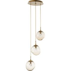 three glass globes hanging from a brass ceiling light with two bulbs on each side