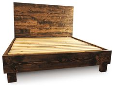 a bed with wooden headboard and foot board made out of pallet wood, isolated against a white background