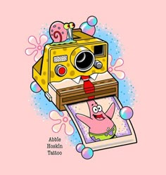 an image of a cartoon camera on top of a photo album with bubbles around it