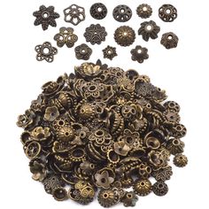 an assortment of bronze colored metal buttons and screws