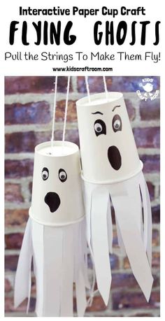 two paper cups with googly eyes and mouths hanging from the ceiling, text overlay reads interactive paper cup craft flying ghost