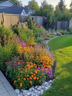 a garden with lots of flowers in it