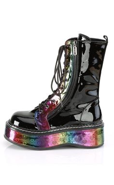 Here are a series of boots for true fans of the Chunk™. A thick platform to keep you comfy and tall as you stomp through the crowds. Vegan Black patent leather/ rainbow hologram 2 inch platform Calf boot Heart print Lace up Double zips Razor charms U.S sizing-refer to size chart for more info Demon Vtuber, Rainbow Goth, Hologram Shoes, Emo Boots, Rainbow Boots, Goth Platform Boots, Night Butterfly, Heart Platforms, Weird Shoes