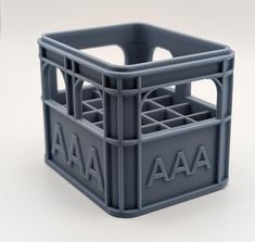 a gray plastic container with the letters aa and aa on it's front side