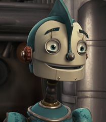 a robot with big eyes standing in front of a metal object and looking at the camera