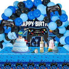 a video game themed birthday party with blue and black balloons