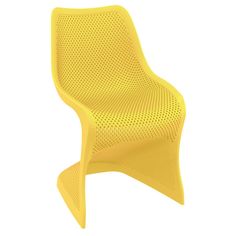 a yellow plastic chair on a white background