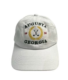 Augusta Georgia golf design embroidered on a unstructured dad baseball hat.  Customize you hat with your choice of color.  Design is embroidered as shown with thread colors as shown. Primary Color is the hat color.  Item Details: 100% cotton twill Pigment dyed Garment washed Low Profile 6 panel Brass buckle or Velcro adjustable strap One size fits most No returns or exchanges on customized items. Please contact me at any time for concerns about your purchase. Collegiate Cotton Dad Hat With Curved Brim, Adjustable Trucker Hat With Embroidered Logo And Visor, Collegiate Cotton Dad Hat With Embroidered Logo, Snapback Dad Hat With Letter Embroidery For Baseball Season, Collegiate Adjustable Dad Hat With Curved Visor, Cotton Dad Hat With Letter Embroidery And Flat Bill, Baseball Season Dad Hat With Letter Embroidery, Baseball Cap With Letter Embroidery For Baseball Season, Collegiate Dad Hat With Embroidered Logo