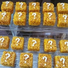 several square treats with question marks on them