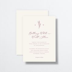 the wedding stationery is displayed on top of a white card with an elegant floral design