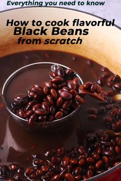 beans being cooked in a pot with text overlay that reads, how to cook flavored black beans from scratch