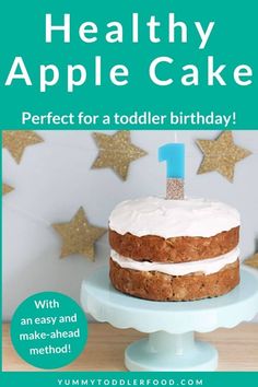 an advertisement for a birthday cake with the number one candle on it and stars in the background