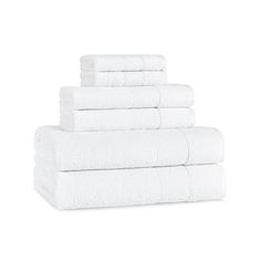 six white towels stacked on top of each other