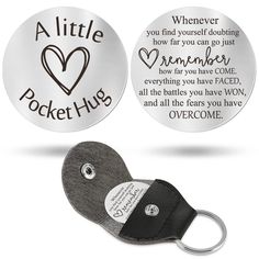 two personalized key chains with the words, little pocket hug and someone else's heart