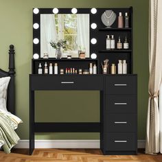 a black vanity with lights on it in a bedroom