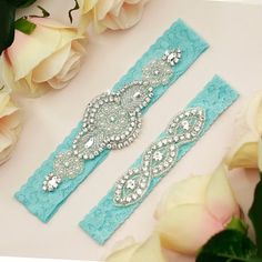 Aqua blue wedding garter set includes both the keepsake garter and toss garter.                                                                                The beautiful and delicate keepsake garter is handmade with 1.5" stretch lace and faux pearl and rhinestone applique measuring 6" wide and 2"high.  The toss garter is made with 1" stretch lace and a rhinestone applique measuring 4" wide and 1"high. Fashion tape is included to keep your garter in place. The garter set comes wrapped in a gif Blue Garter Wedding, Aqua Blue Wedding, Rhinestone Garter, Wedding Garter Blue, Lace Garter Set, Garter Wedding, Wedding Garter Lace, Blue Garter, Something Blue Bridal