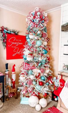 a christmas tree decorated with red, white and blue ornaments