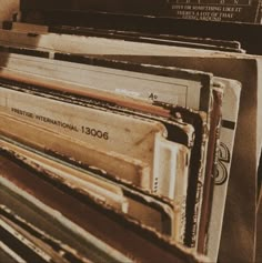 there are many old records stacked on top of each other in this room with the label removed