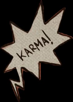 the word karma is written in black and white with an arrow pointing up to it