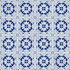 a blue and white tile pattern with an intricate design on the bottom half of it