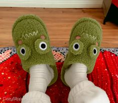 Step into whimsical comfort with these adorable frog slippers 🐸! Crafted with plush materials, they'll keep your feet cozy and warm. Embrace the cuteness and add a touch of fun to your relaxation routine. ✨ For more cozy slippers: https://www.etsy.com/shop/CozySlippers4U Finger Less Gloves Crochet, Frog Slippers, Slippers Funny, Angel Stitch, Funny Slippers, Cow Slippers, Black Cat Plush, Funny House, Green Flip Flops