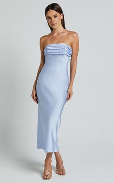 Make a statement with the Margot Midi Dress in Light Blue. This stunning strapless satin dress features a gathered bust detail and a flattering bias cut that accentuates your curves. Perfect for formal events or even as a bridesmaid dress, the Margot Midi Dress is made from high-quality polyester fabric that feels luxurious against your skin. The beautiful light blue color adds an elegant touch to any occasion, while the midi length keeps you looking chic and sophisticated. Step out in style and Briadsmaid Dresses, Formal Dress Midi, Strapless Satin Dress, Light Blue Hair, 2025 Wedding, Dress Light Blue, Coctail Dresses, Bias Cut Dress, Event Dress