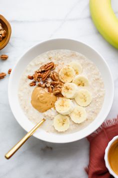 White bowl of banana bread overnight oats Oats With Banana, Banana Bread Overnight Oats, Oats With Milk, Banana Porridge, Indian Food Photography, Oat Bowls, Oatmeal Banana, Easy Overnight Oats, Fit Recipes