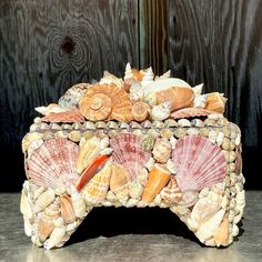 Bring seaside charm to your home with this Vintage Coastal Shell Encrusted Box. Handcrafted with an array of natural shells, this box exudes a breezy, beachy vibe, perfect for adding coastal elegance to any space. Use it to store trinkets or display it as a decorative piece—its intricate shell detailing and timeless appeal make it a true treasure for coastal and vintage decor lovers alike Vintage Coastal, Coastal Elegance, Vintage Decor, Decorative Pieces, Shells, Make It