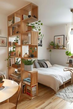 a bed room with a neatly made bed and wooden shelves