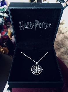 the harry potter necklace is in its box