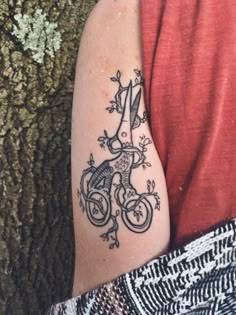 a person with a tattoo on their arm