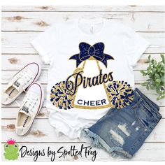 a t - shirt that says, pirates cheer with a bow on it and some denim shorts