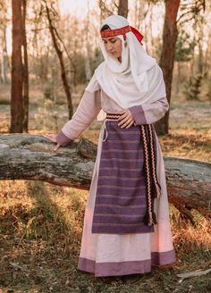 "Early medieval Slavonic costume set: 1) Early medieval dress from Pskov, with hems on cuffs and bottom of the dress 2) Apron: apron made of striped wool, is composed of two parts connected by a cord. 3) Embroidered headband with massive temples rings a very distinctive Slavic feminine jewellery. 4) Cream white scarf - 200 cm x 75 cm wide (79\" x 30\")- handy addition and underlines the status of married women 5) Woven belt 200 cm long (79\") All stitches are made by machine. Variant 1 - Dress + Slavic Dress, Slavic Clothing, Embroidered Headband, Russian Clothing, Dress Apron, Married Women, Viking Dress, Early Medieval, Silk Headband