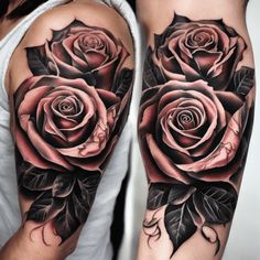 a woman's arm with roses and leaves on it