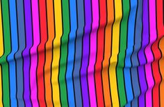 an abstract rainbow colored background with wavy lines