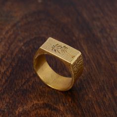 Engraved signet ring, Palm Tree Ring, Gold Signet Ring, Dainty Ring, Statement Ring, Tree signet ring, Hammered ring, Gold brass ring, Gifts Metal:- Brass ✦ Our rings are made of high-quality Brass metal and are carefully crafted by hand in our family workshop. The brass metal will develop a nice antique color over time. So, I suggest cleaning it once in a while for getting back to the shiny original color. You can use natural ingredients like lemon or vinegar with water to clean it. Also, apply a thin coat of transparent nail paint/nail enamel on the ring's inner side to save it from being tarnished. ❥ You may request to return the products, 15 days after you received the items (Delivery Day). The buyer is responsible for the shipping costs for the return. (We may have slower production a Brass Engraved Ring Tarnish Resistant For Gift, Tarnish Resistant Brass Engraved Ring For Gift, Tarnish Resistant Brass Signet Ring Gift, Brass Tarnish-resistant Signet Ring Gift, Engraved Brass Signet Ring As Gift, Handmade Gold Signet Ring For Promise, Etched Brass Rings For Gifts, Etched Brass Rings As Gifts, Palm Tree Jewelry