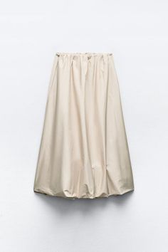 BALLOON MIDI SKIRT - White | ZARA United States Spring Voluminous Pleated Skirt With Elastic Waistband, High Waist Gathered Skirt For Daywear, High Waist Skirt With Bottom Hem For Summer, Chic Cotton Pleated Summer Skirt, Chic Pleated Cotton Skirt For Summer, Chic Cotton Pleated Skirt For Summer, Chic Summer Cotton Pleated Skirt, Beige Lined Maxi Skirt For Daywear, Beige Lined Skirt For Spring