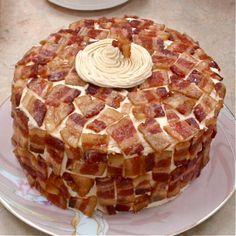 there is a cake that has been made to look like bacon on the top and bottom