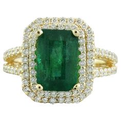 4.42 Carat Natural Emerald 14 Karat Solid Yellow Gold Diamond Ring Stamped: 14K Total Ring Weight: 7.1 Grams Emerald Weight: 3.42 Carat (11.00x9.00 Millimeters) Diamond Weight: 1.00 Carat (F-G Color, VS2-SI1 Clarity ) Diamond Quantity: 93 Face Measures: 15.80x13.35 Millimeter SKU: [600252] Yellow Gold Diamond Ring, Emerald Diamond Ring, La Face, Gold Diamond Ring, Gold Diamond Rings, Emerald Diamond, Natural Emerald, Solid Yellow, Yellow Gold Rings